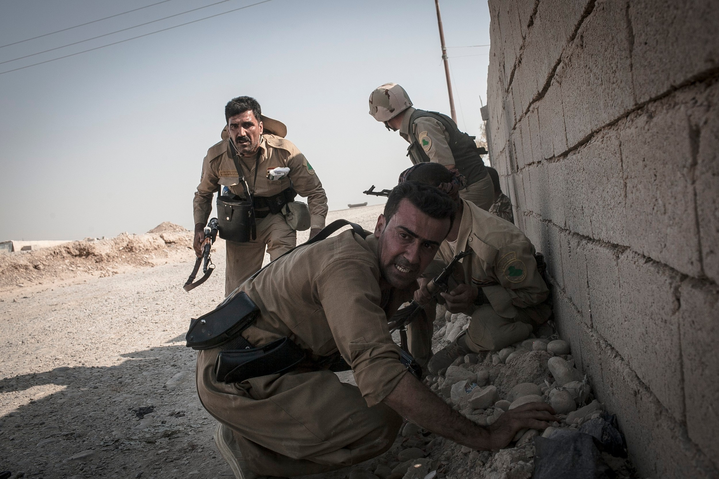 Kurdští ozbrojenci v boji s Islámským státem.