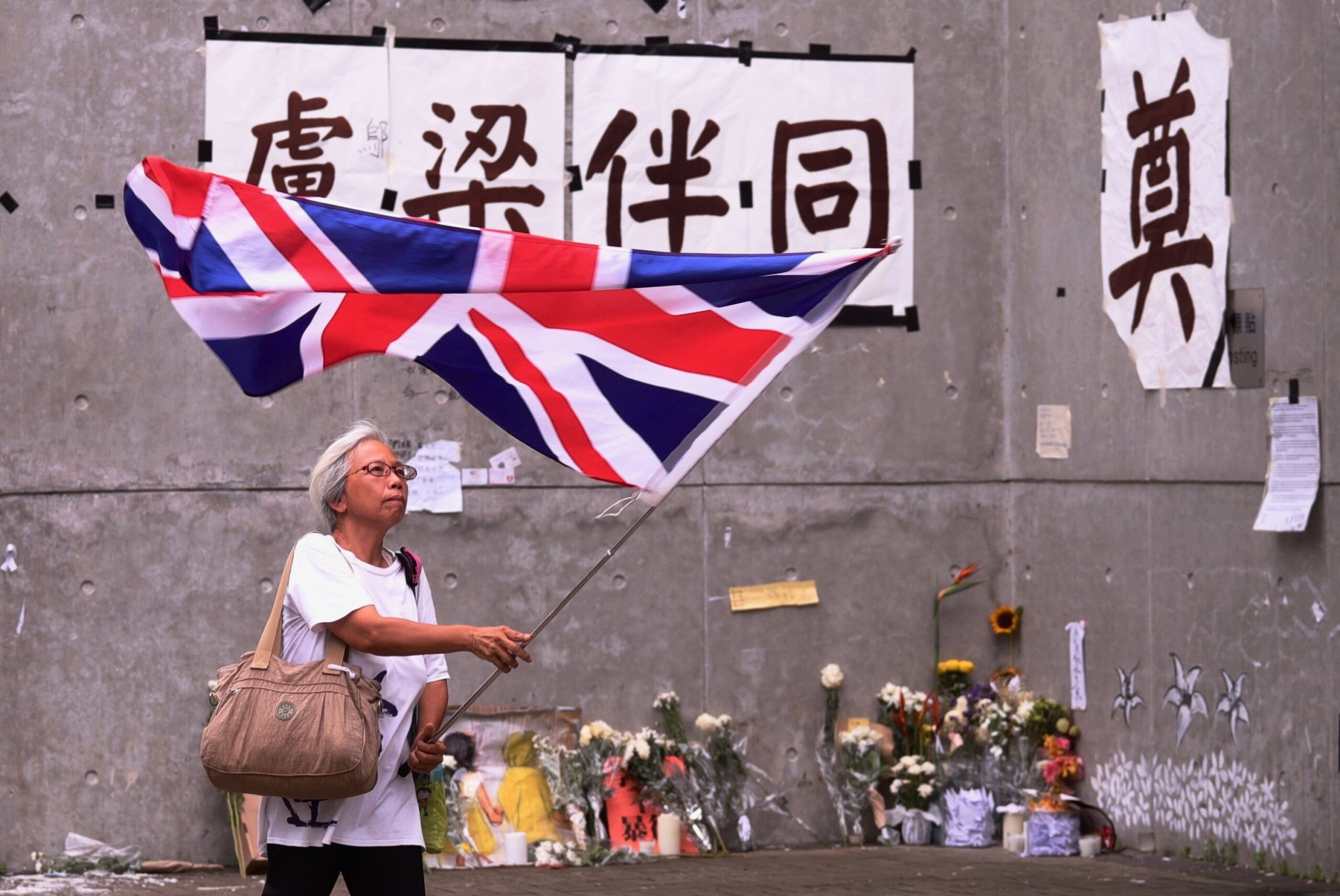 Čínská demonstrantka alias babička Wong. Hongkong, 9. července 2019.